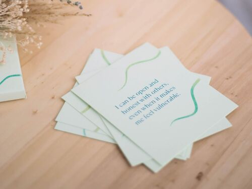 affirmation cards on table