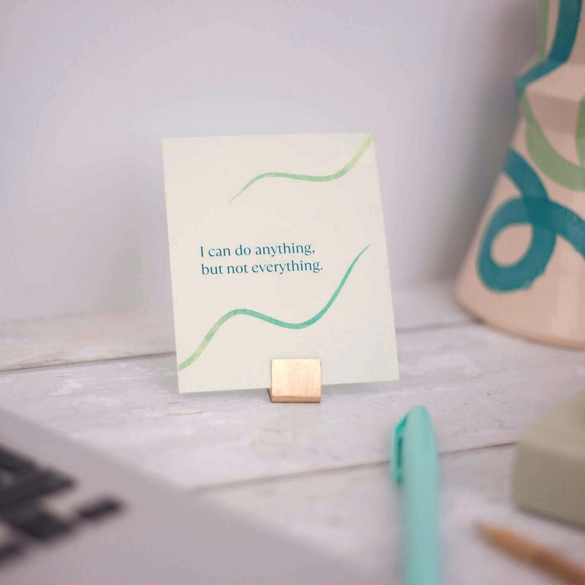 self-compassion affirmation card on stand