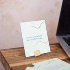 affirmation cards for work on desk