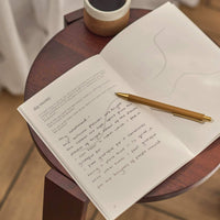 gratitude journal open on gratitude journal prompt about nature