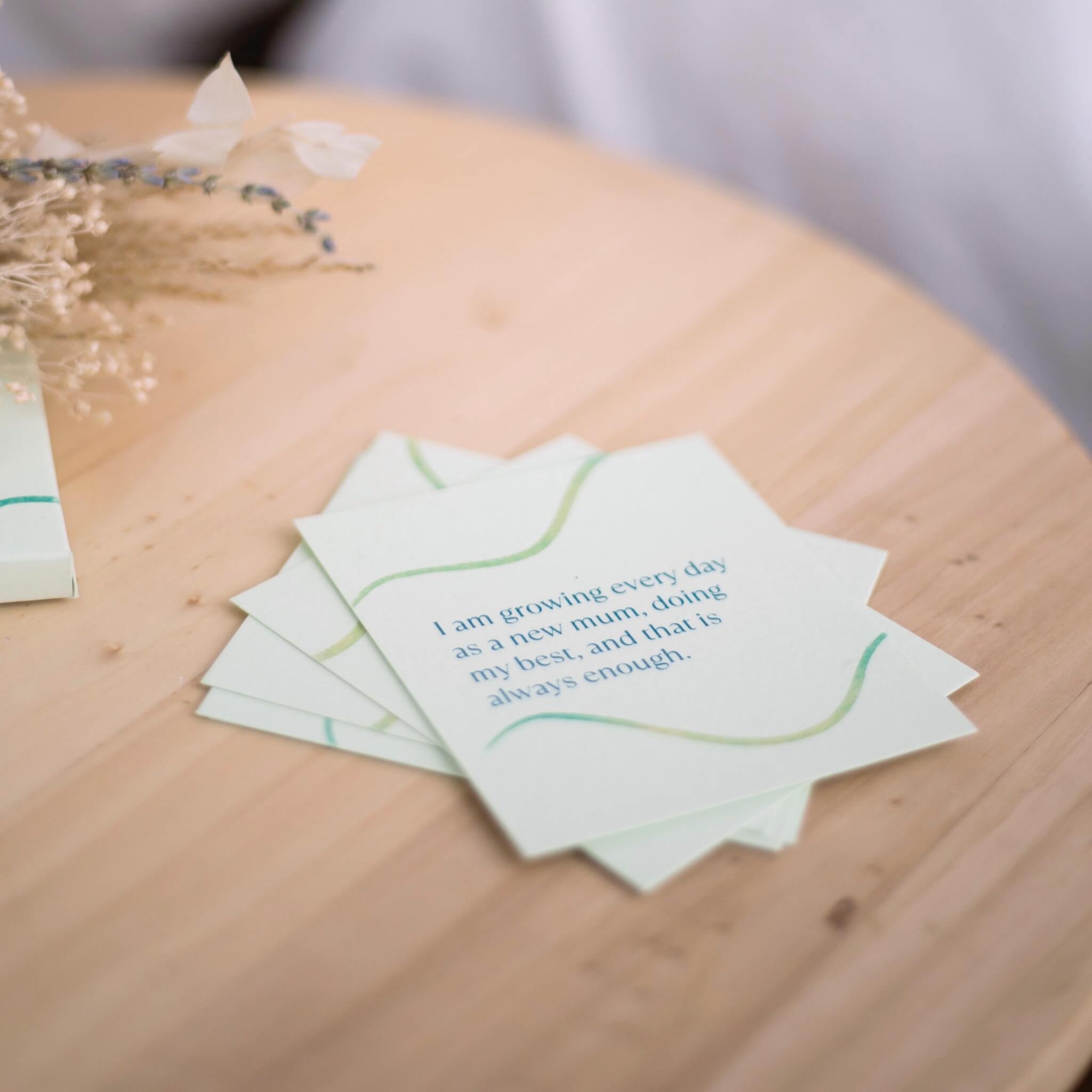 new mum affirmation cards with stand on bedside table